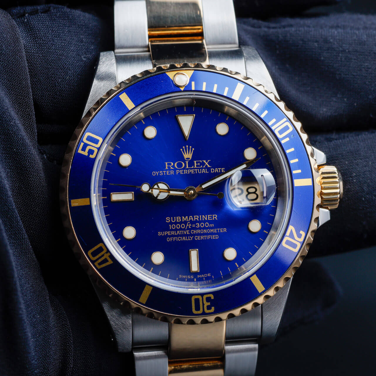 Rolex Submariner Datum stahl/gelbgold 8