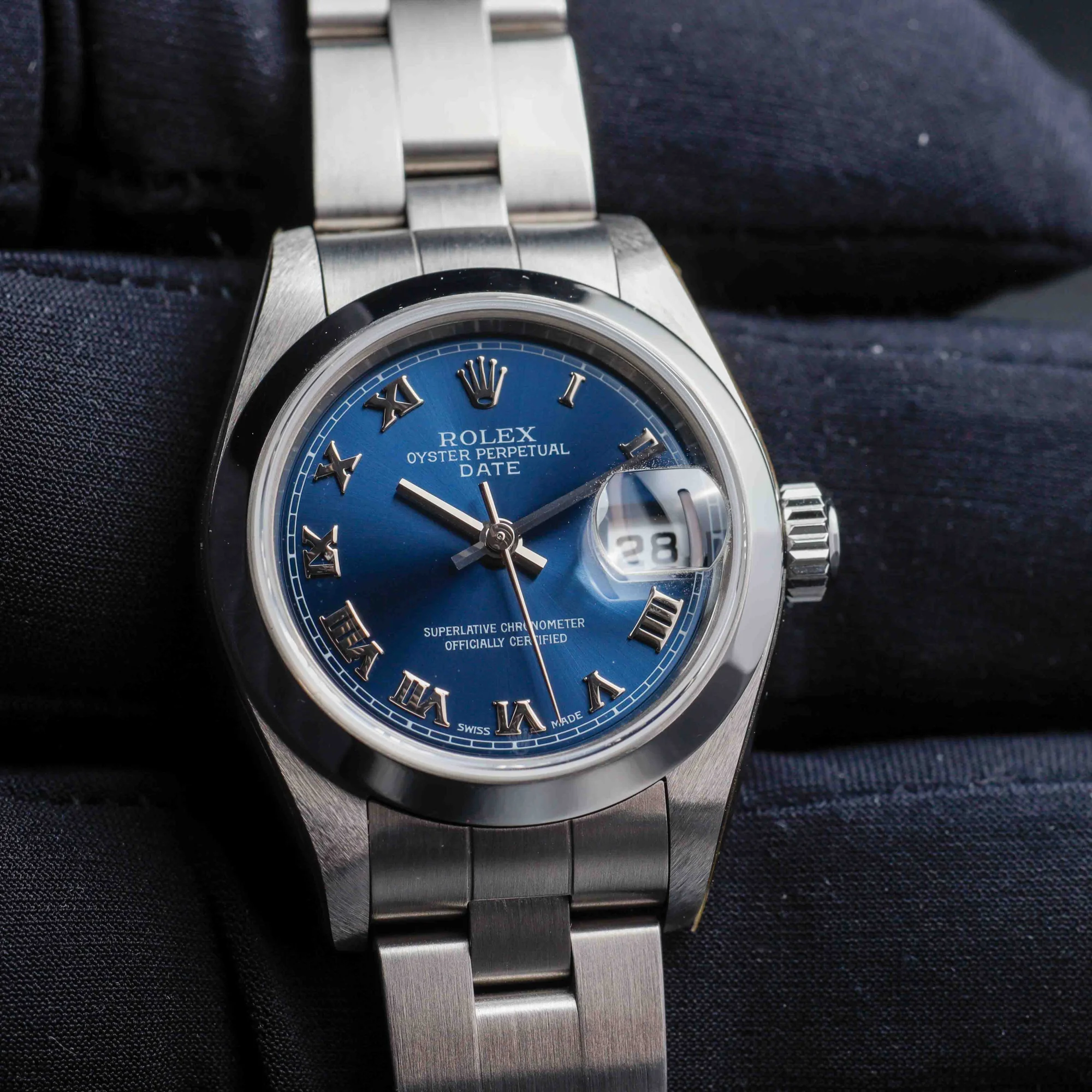 Rolex Oyster Perpetual Lady-date 26 nos Condition. acier 10